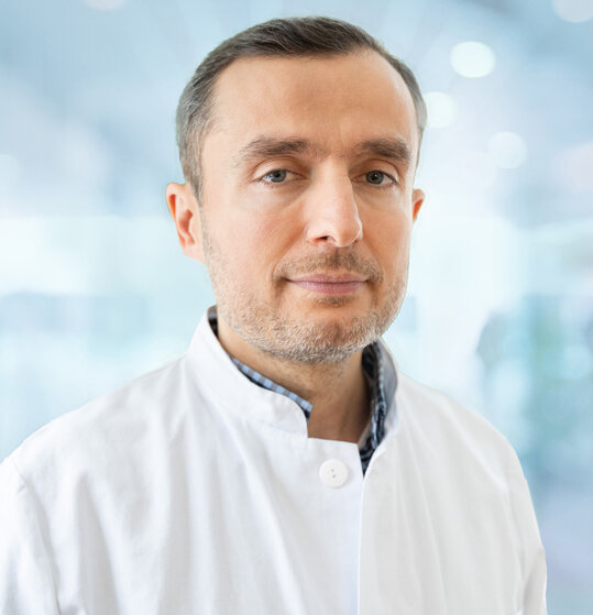 Dr. Midgat Mustafi 